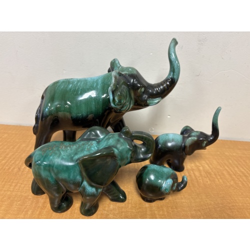 Bin34 ts Set of 4 Blue Mountain Pottery elephants- one has Reversing Falls etched on back (wrapped in bag)